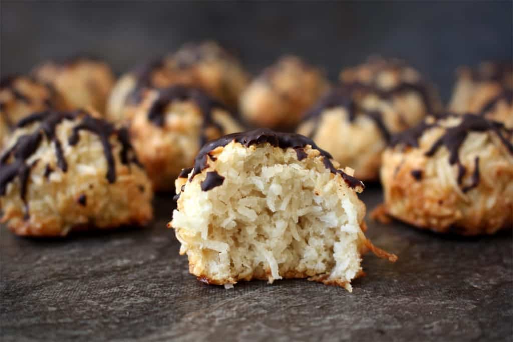 Crumb shot of a macaroon with a bite taken off.