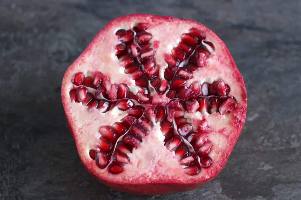 Pomegranate sliced in half.