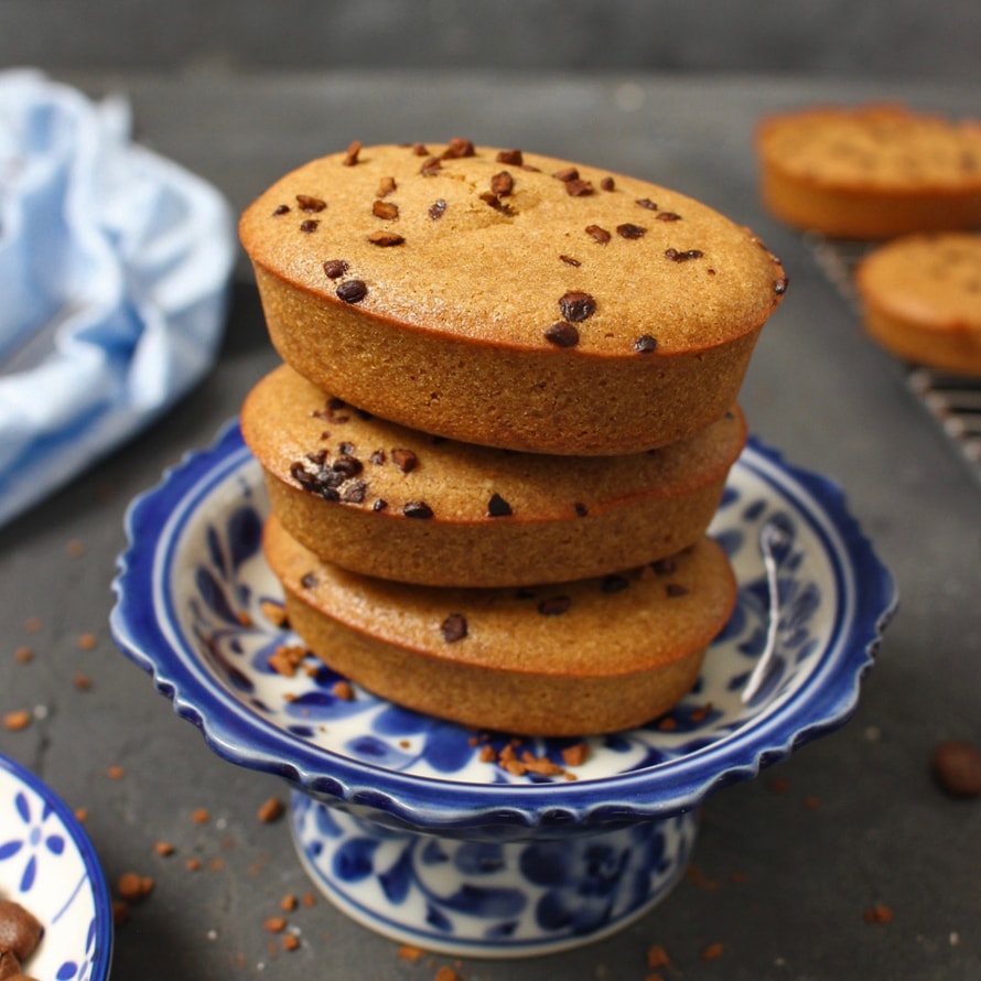 Stack of 3 financiers over a small blue stand