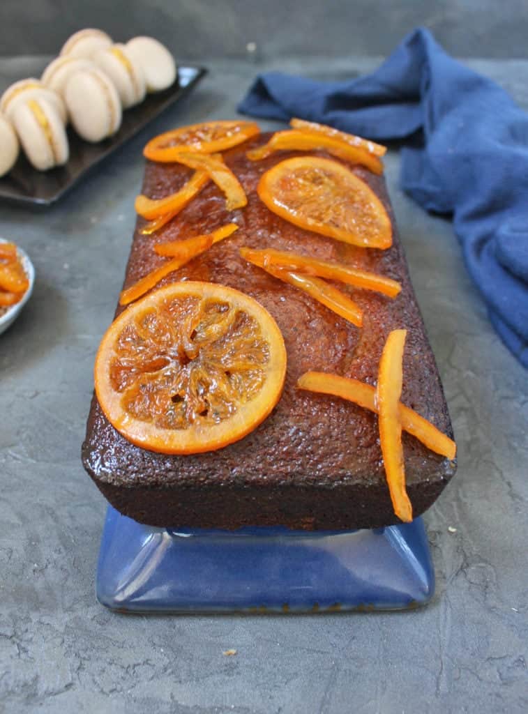 Close up on the candied oranges over the glazed cake