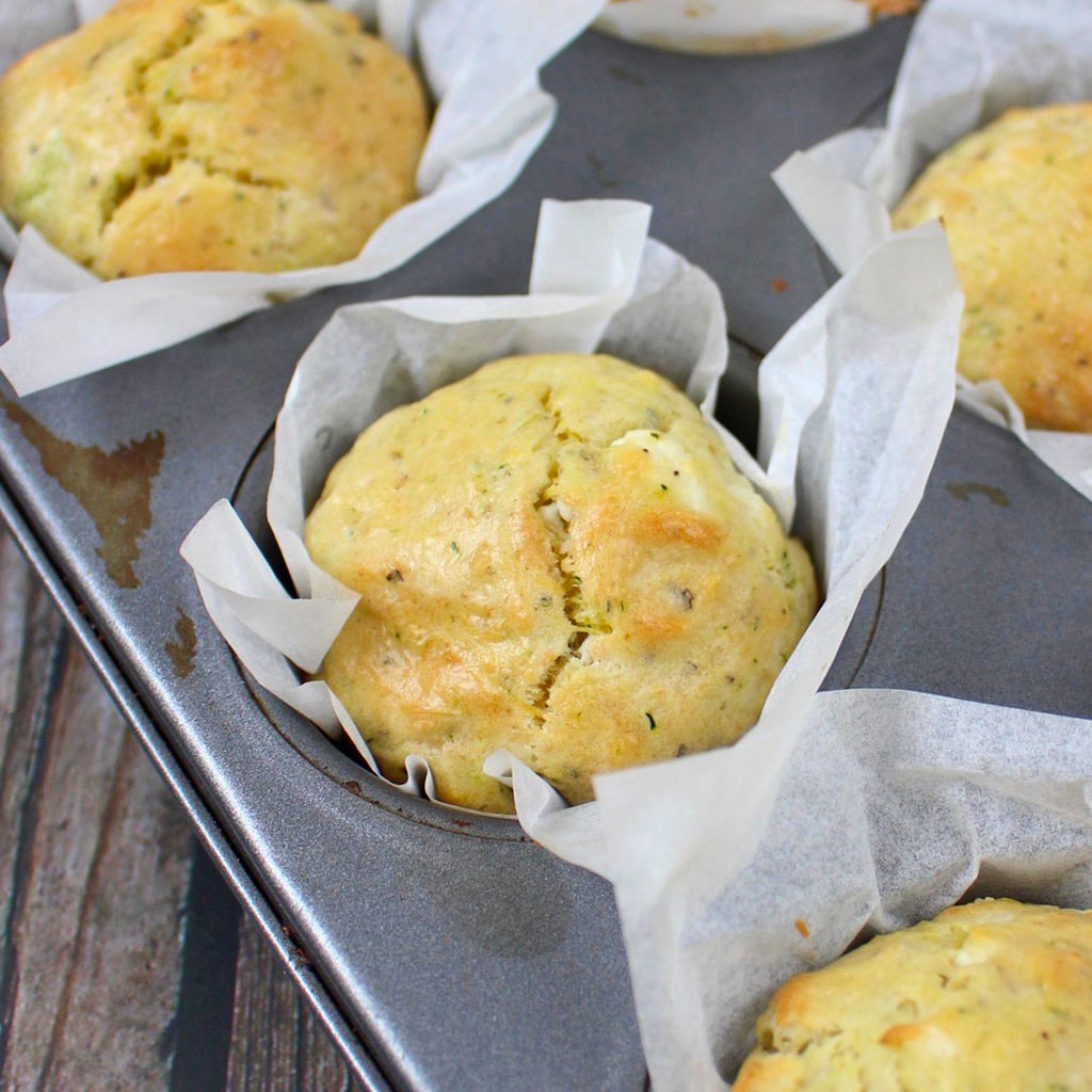 Close up on a Goats Cheese Zucchini Muffin in the baking tray.