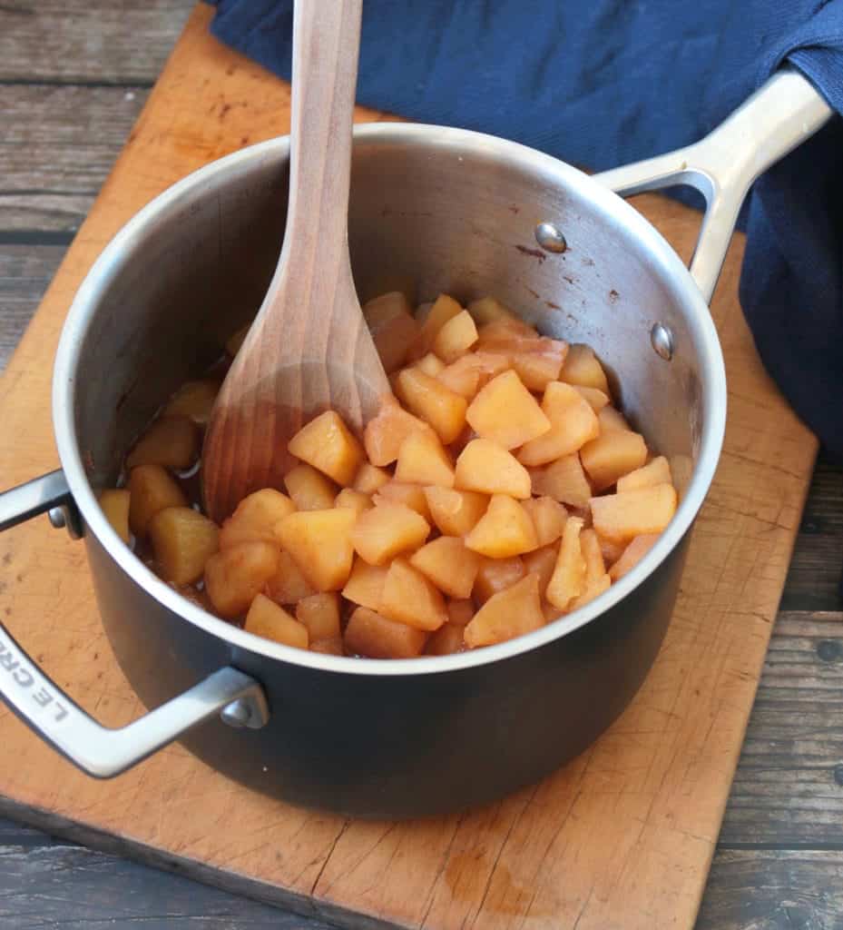 Cut apples in a metal pot