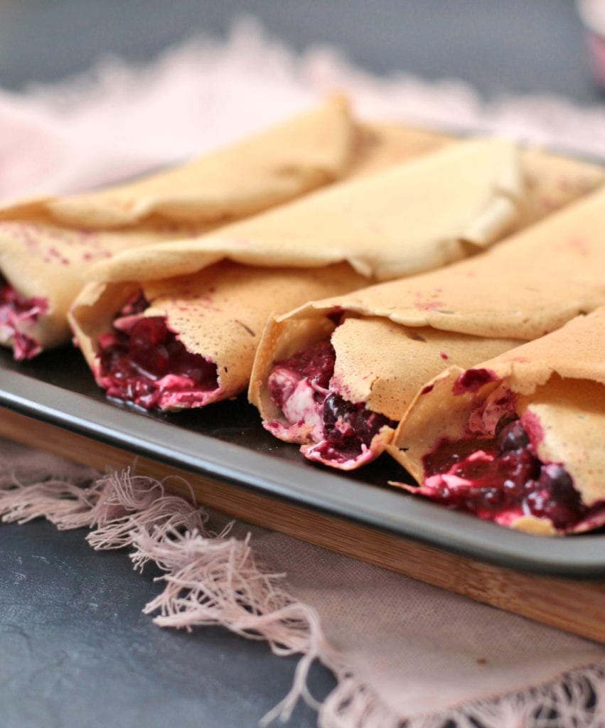 Crepes filled with berry compote - close up