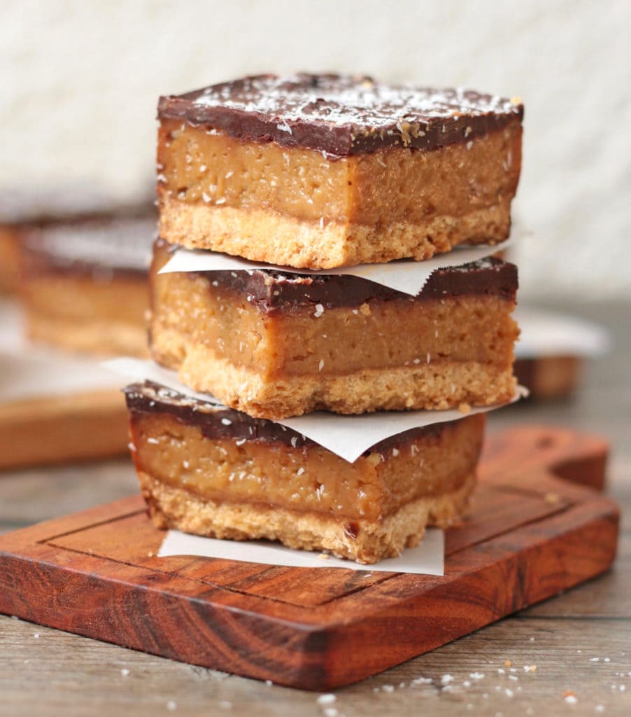 Stack of 3 slices over a small wooden board