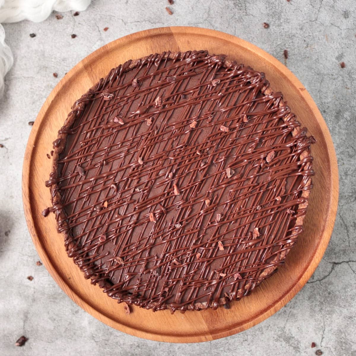 Dessert from above on a wooden cake stand.