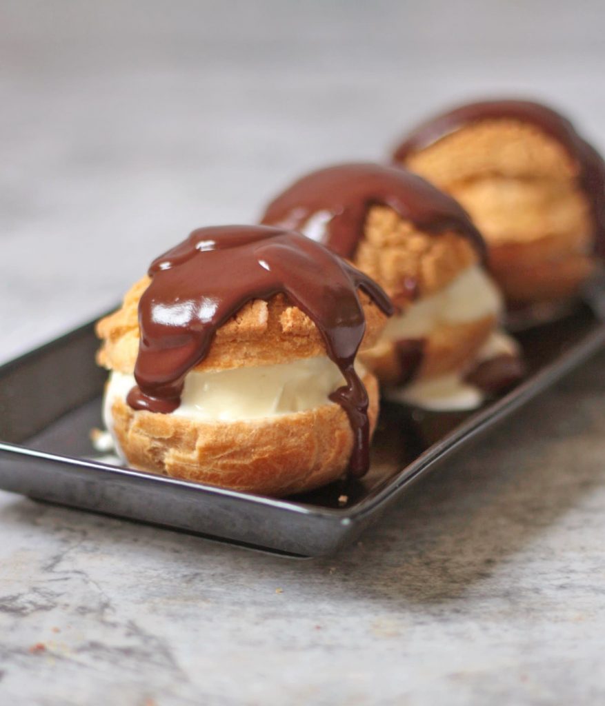 Vanilla Ice Cream Choux with Chocolate Sauce.