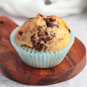 Close up on one Muffin on a wooden board