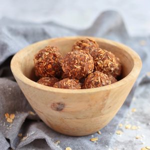 Peanut Butter Energy Balls in a wooden bowl