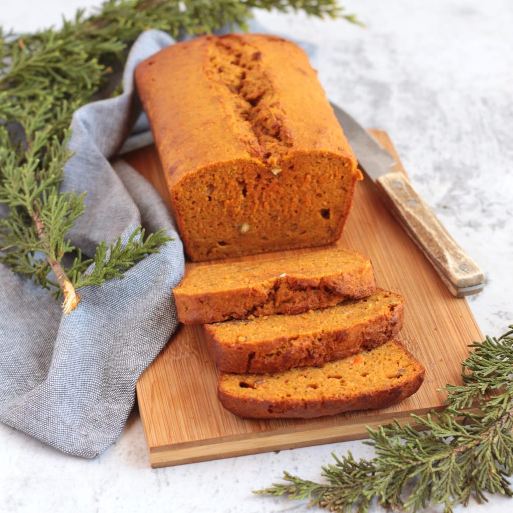 Carrot Loaf Cake on a wooden board