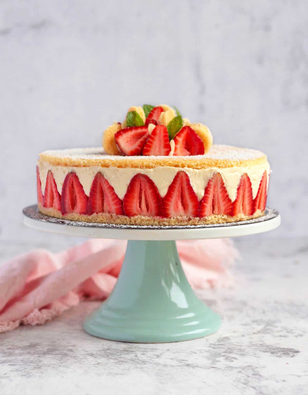 Strawberry Fraisier on a Cake Stand.