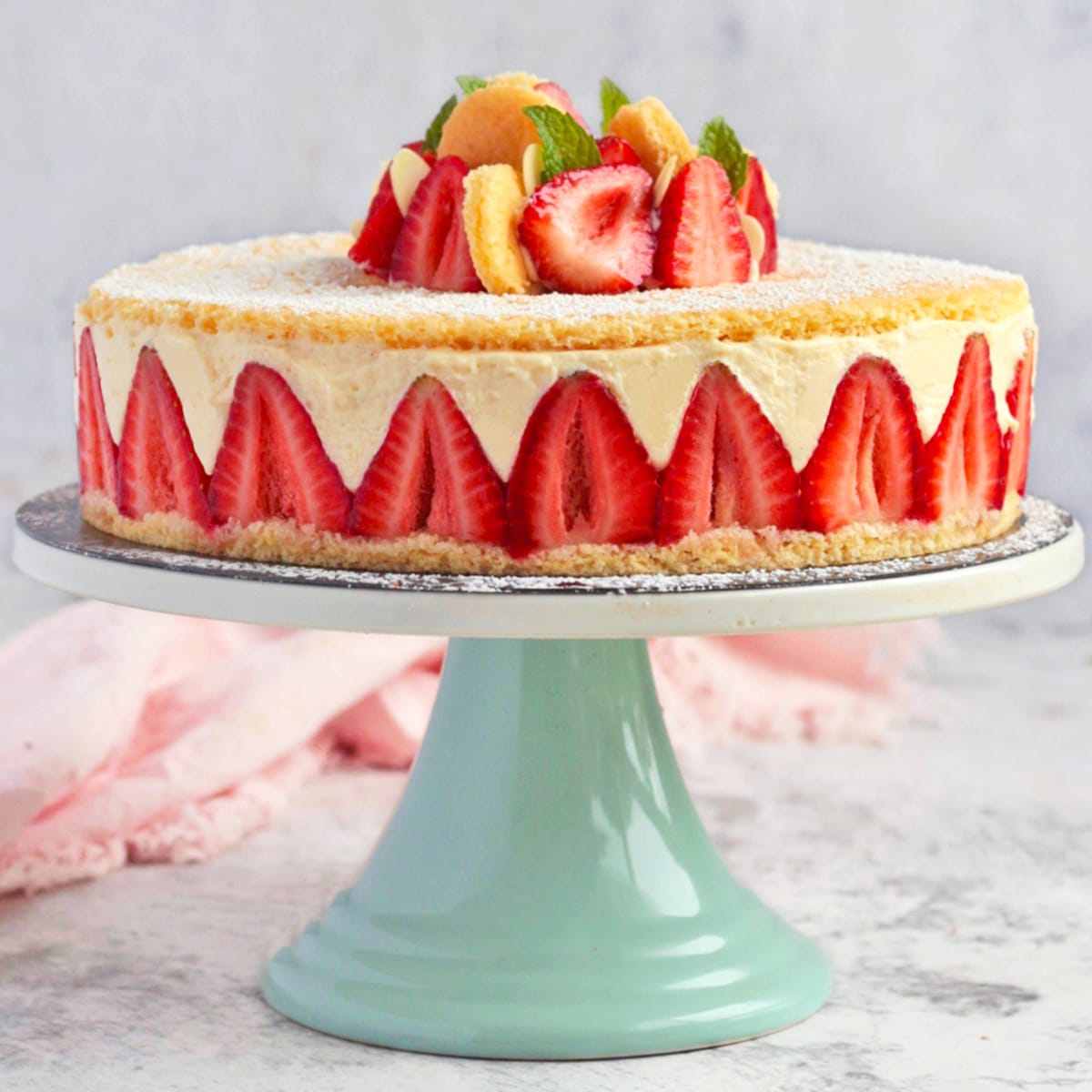 Fraisier Cake on a Green Cake Stand.