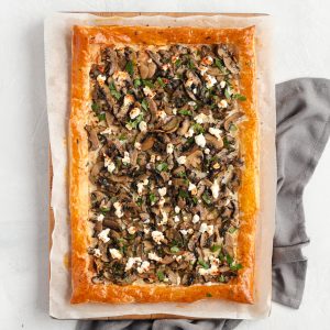 Baked Tart from above with grey napkin