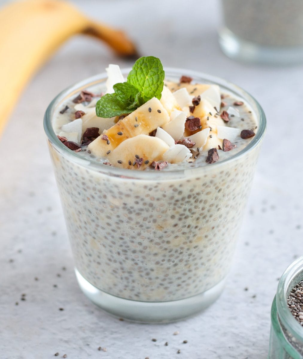 One Chia Seed Pudding topped with banana slices and fresh mint