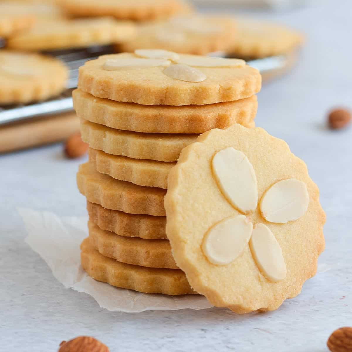 Stack of Cookies decorated with Flaked Almonds.