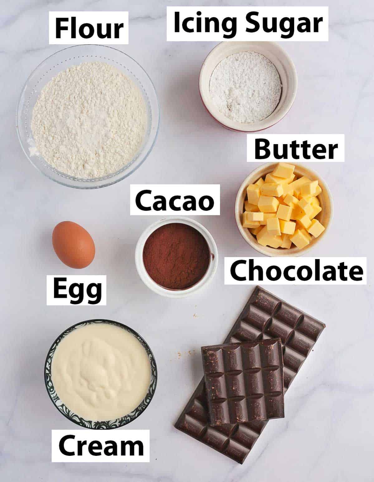 Ingredients placed on a white surface.