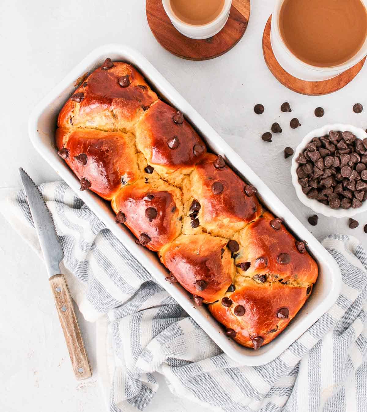 Baked bread in the loaf pan from above.