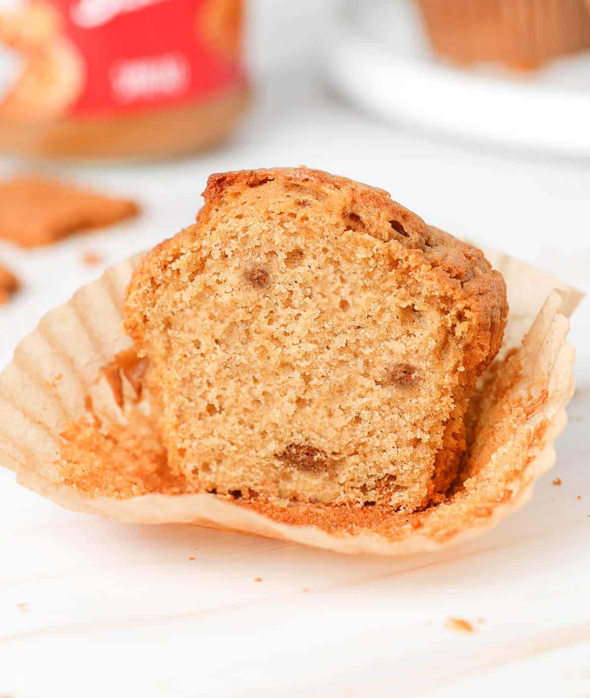Muffin sliced in haf in its wrapper (Crumb Shot).