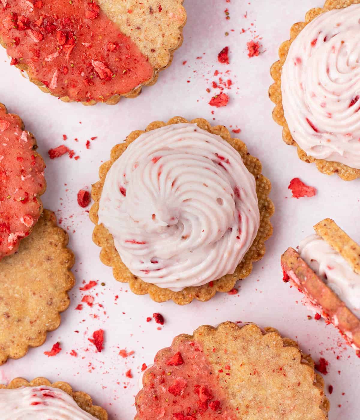 Cheesecake filling piped over a cookie seen from above.