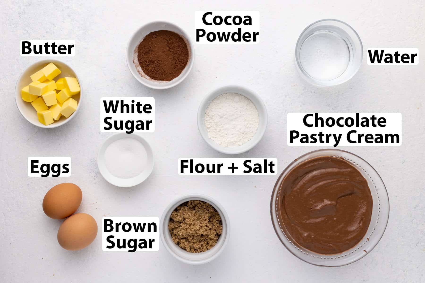 Ingredients laid on a white surface.