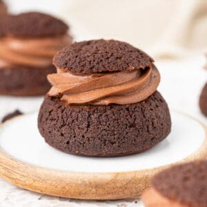 Close up on a choux filled with piped chocolate cream.