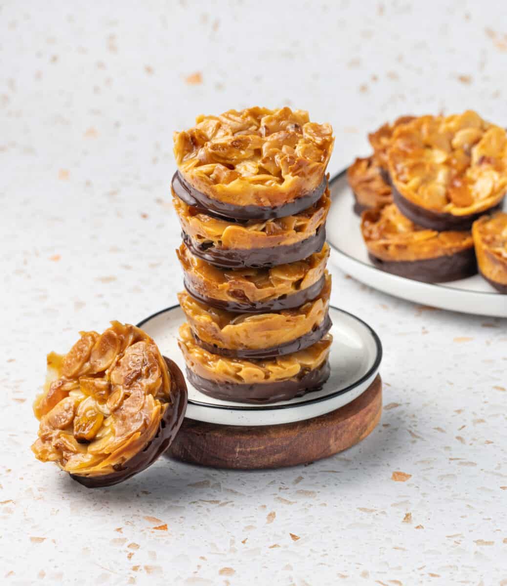 Stack of florentines cookies over a small white plate.