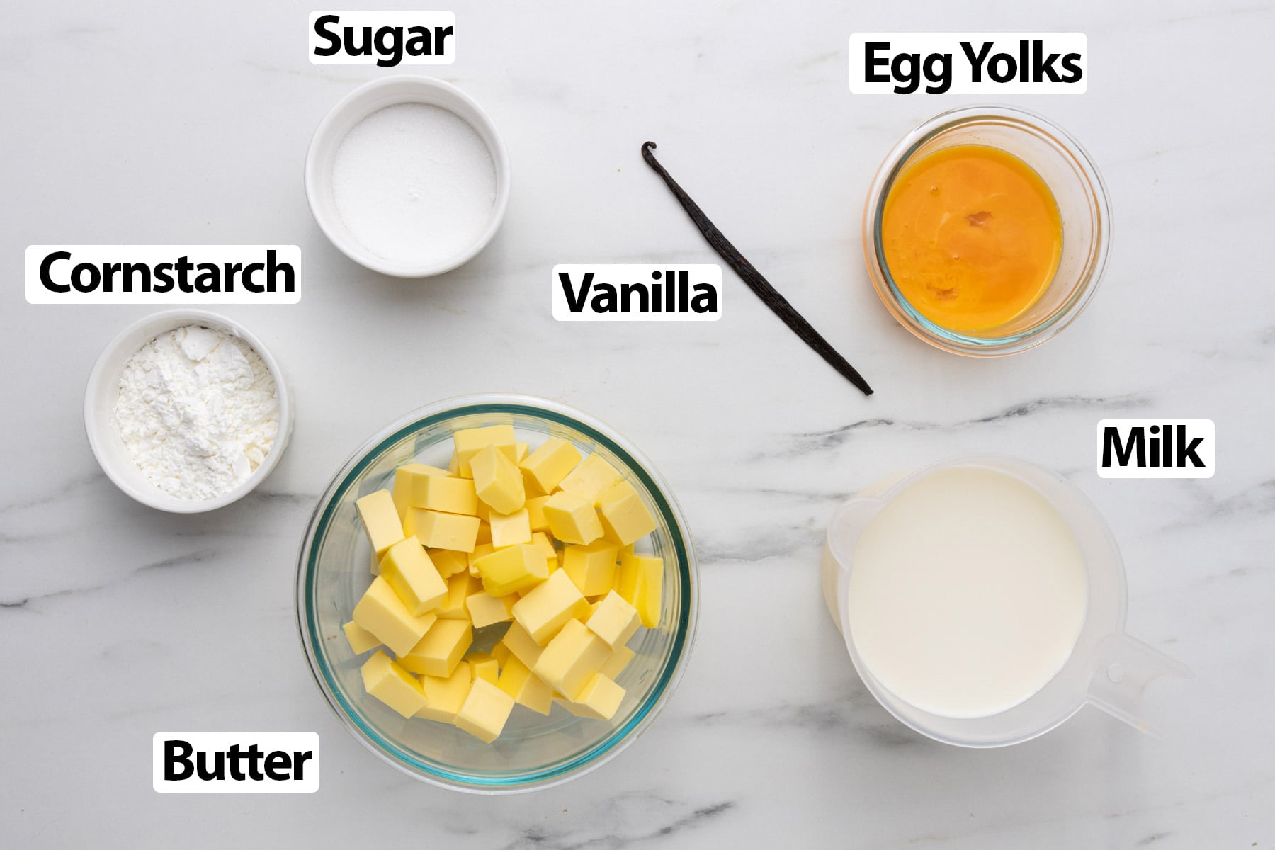 Ingredients laid on a marble surface.