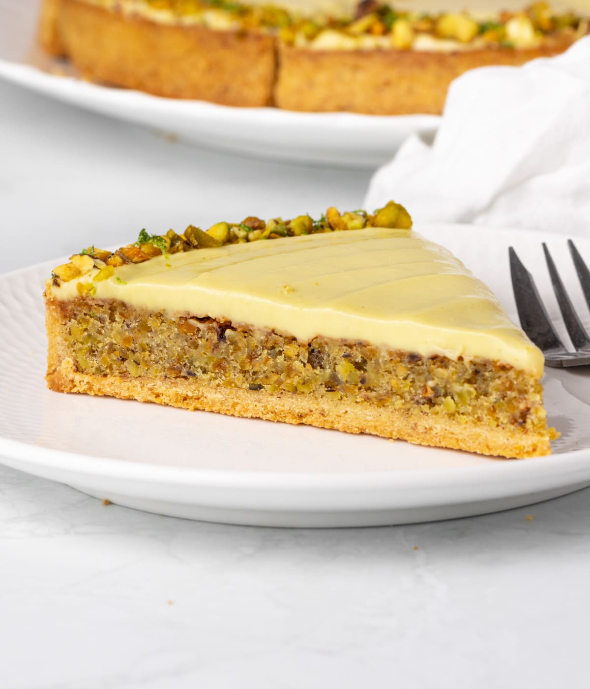 One slice on a small white plate.