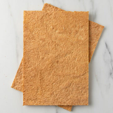 Two dacquoise sheets on top of each other seen from above.